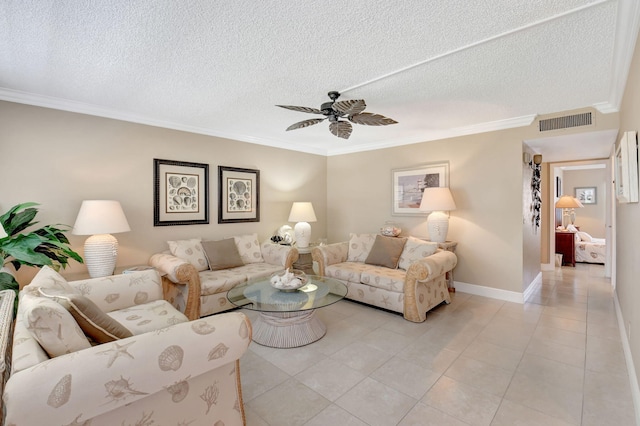 living room with a ceiling fan, visible vents, a textured ceiling, and crown molding