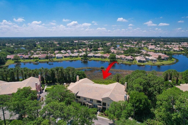 aerial view featuring a water view and a residential view