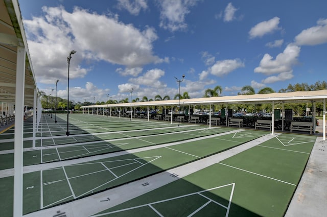 view of property's community featuring shuffleboard