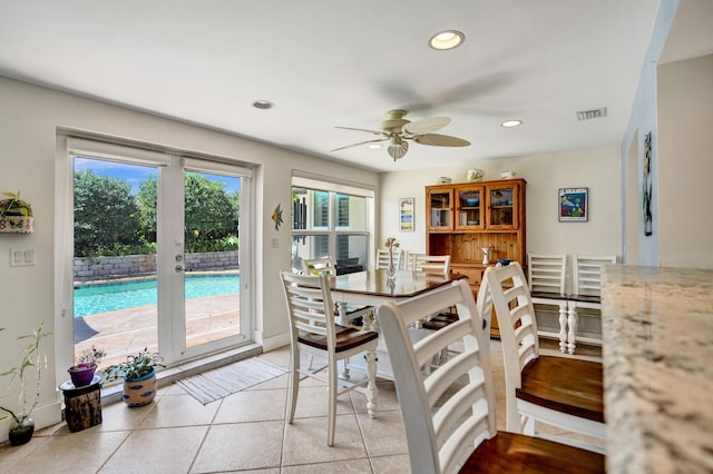 dining room featuring baseboards, recessed lighting, light tile patterned floors, visible vents, and ceiling fan