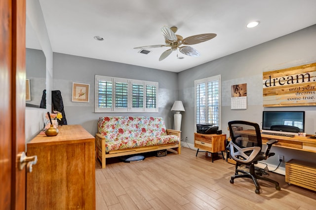 office area with visible vents, light wood finished floors, recessed lighting, and a ceiling fan
