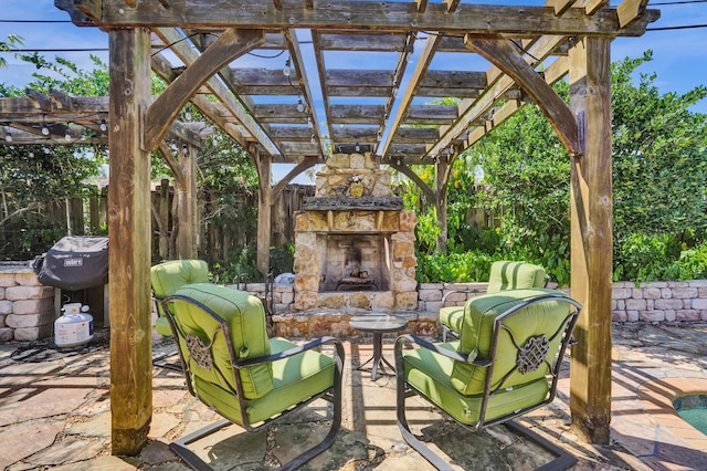 view of patio / terrace featuring a pergola, an outdoor living space with a fireplace, and fence
