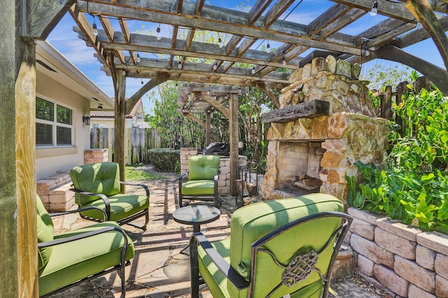 view of patio / terrace featuring a pergola, an outdoor living space with a fireplace, and fence