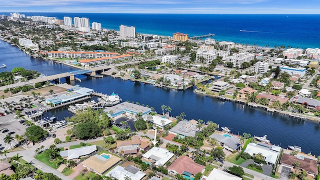 drone / aerial view with a water view and a city view
