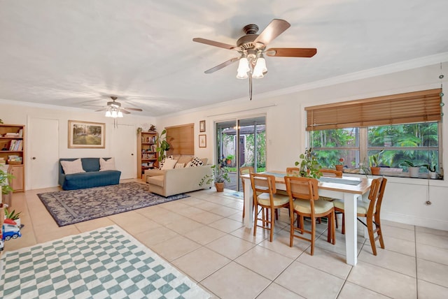 630 Glenridge Dr, West Palm Beach, FL 33405 - dining space featuring light tile patterned flooring, ceiling fan, and ornamental molding
