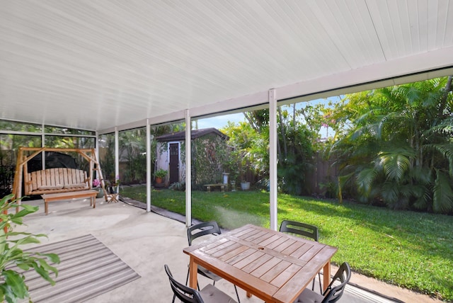 630 Glenridge Dr, West Palm Beach, FL 33405 - sunroom / solarium featuring outdoor dining space