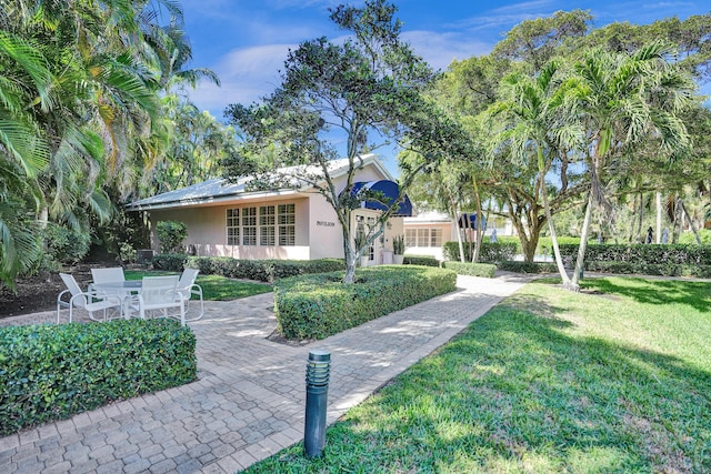exterior space with a yard