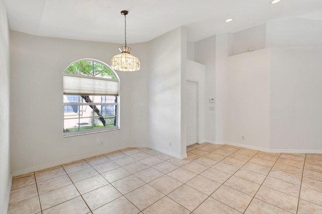 empty room with baseboards, a notable chandelier, recessed lighting, and vaulted ceiling