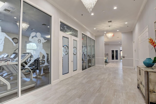 corridor with crown molding, recessed lighting, french doors, an inviting chandelier, and baseboards