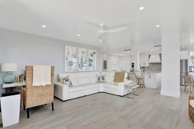 1149 Hillsboro Mile Unit 112N, Hillsboro Beach, FL 33062 - living area with recessed lighting, light wood-style floors, and ceiling fan
