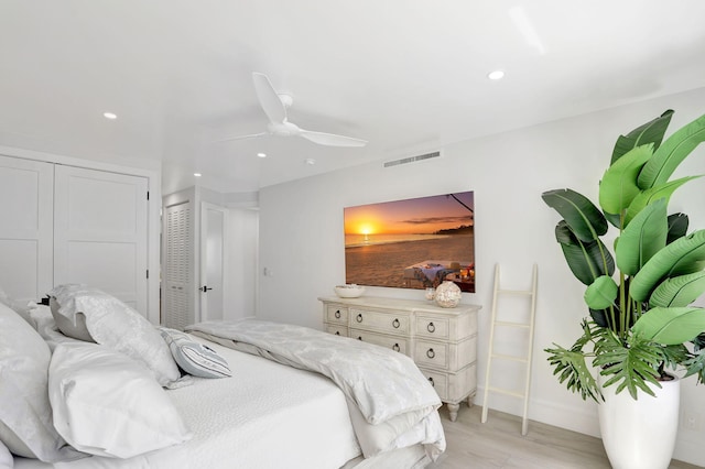 1149 Hillsboro Mile Unit 112N, Hillsboro Beach, FL 33062 - bedroom with visible vents, recessed lighting, light wood-type flooring, and a ceiling fan