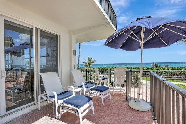 1149 Hillsboro Mile Unit 112N, Hillsboro Beach, FL 33062 - balcony featuring a sunroom and a water view