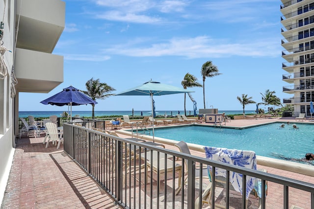 1149 Hillsboro Mile Unit 112N, Hillsboro Beach, FL 33062 - pool featuring a patio