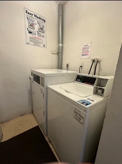 664 SE 20th Ave Unit 1, Deerfield Beach, FL 33441 - shared laundry area featuring washer and clothes dryer
