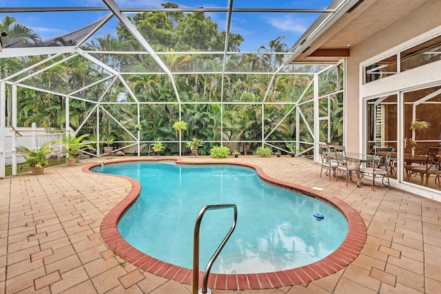 11604 Kensington Ct, Boca Raton, FL 33428 - outdoor pool with a patio and glass enclosure