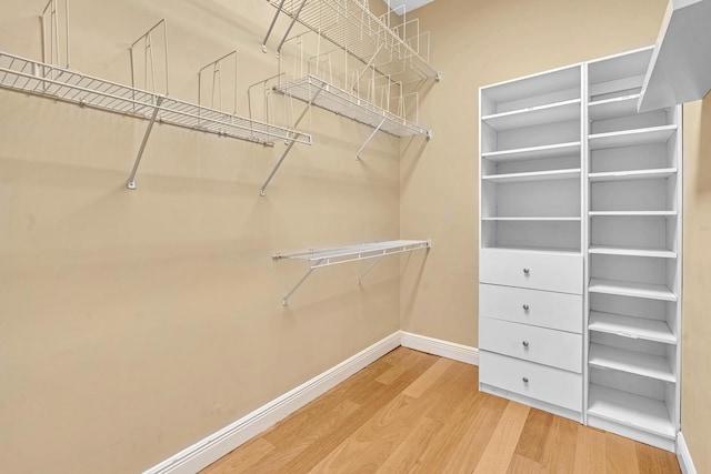 11604 Kensington Ct, Boca Raton, FL 33428 - walk in closet with wood finished floors