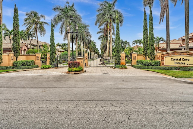 11604 Kensington Ct, Boca Raton, FL 33428 - view of street featuring a gated entry, a residential view, a gate, and curbs