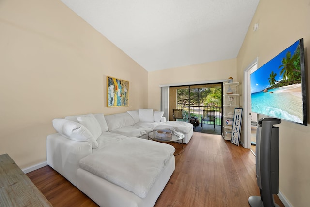 301 Norwood Ter Unit N230, Boca Raton, FL 33431 - living area featuring baseboards, high vaulted ceiling, and wood finished floors