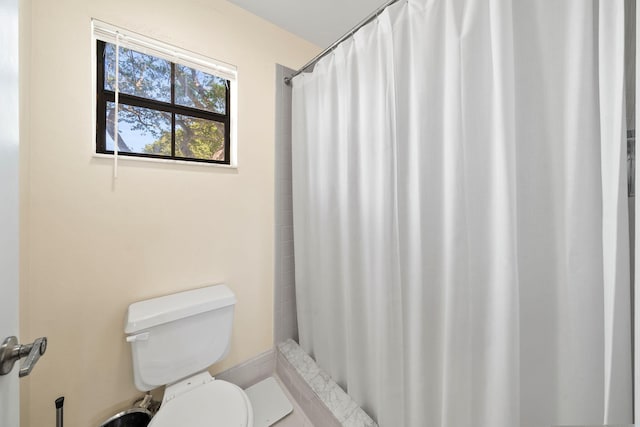 301 Norwood Ter Unit N230, Boca Raton, FL 33431 - bathroom with a shower with curtain and toilet