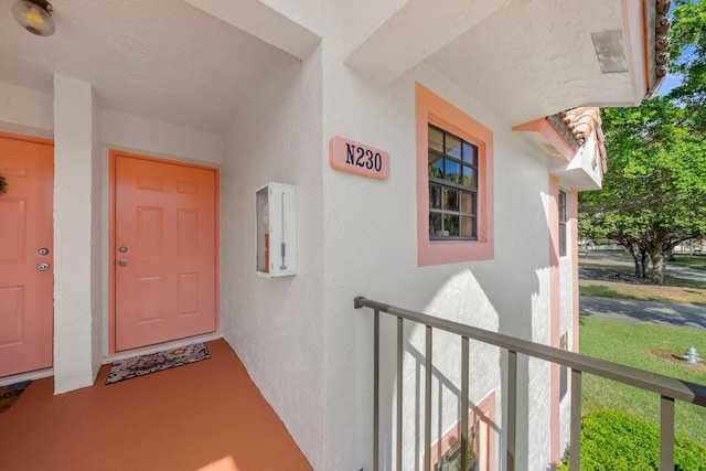 301 Norwood Ter Unit N230, Boca Raton, FL 33431 - property entrance featuring stucco siding