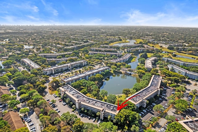 drone / aerial view featuring a water view