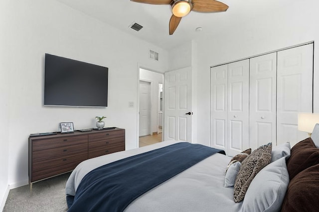 9827 Galleon Dr, West Palm Beach, FL 33411 - carpeted bedroom with ceiling fan, a closet, and visible vents