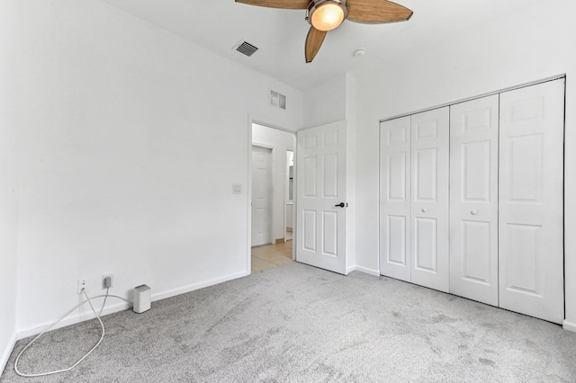 9827 Galleon Dr, West Palm Beach, FL 33411 - unfurnished bedroom with baseboards, visible vents, and carpet floors