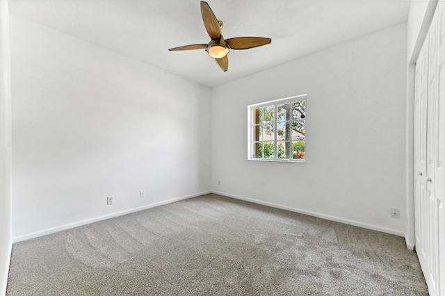 9827 Galleon Dr, West Palm Beach, FL 33411 - unfurnished bedroom featuring carpet, baseboards, a closet, and a ceiling fan