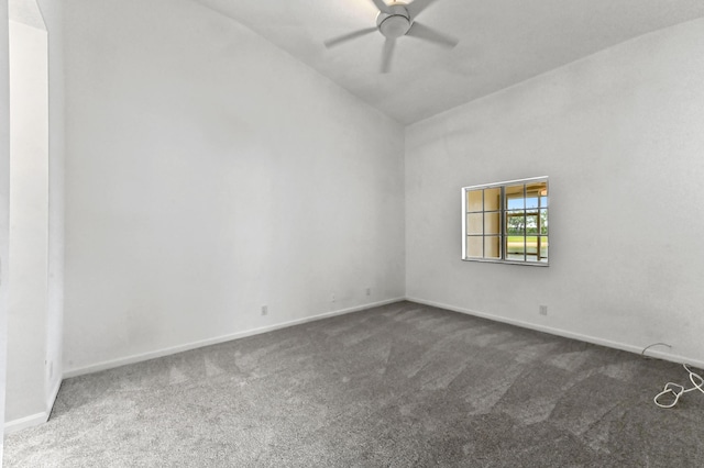 9827 Galleon Dr, West Palm Beach, FL 33411 - carpeted empty room featuring vaulted ceiling, baseboards, and a ceiling fan