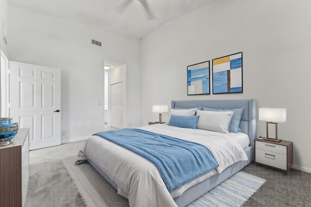 9827 Galleon Dr, West Palm Beach, FL 33411 - carpeted bedroom featuring baseboards, a ceiling fan, and visible vents
