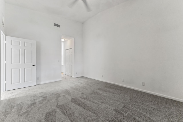 9827 Galleon Dr, West Palm Beach, FL 33411 - unfurnished bedroom with visible vents, baseboards, ceiling fan, and carpet floors