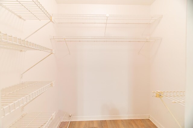 4375 Forest Ln, Palm Springs, FL 33406 - walk in closet featuring light wood-style floors