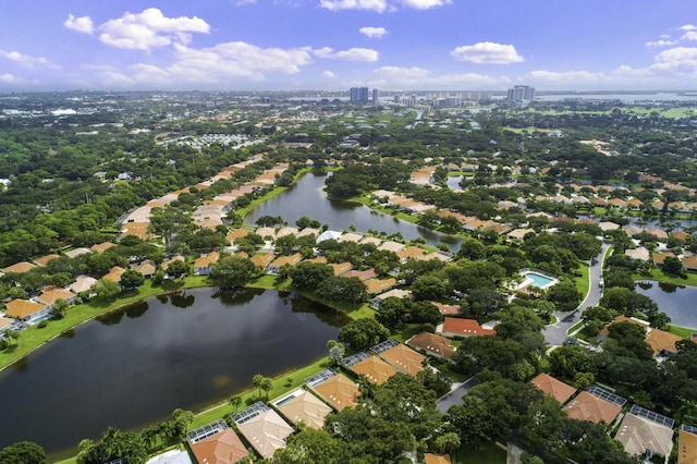 drone / aerial view with a water view