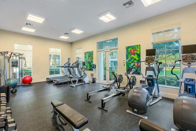 exercise room featuring visible vents and baseboards