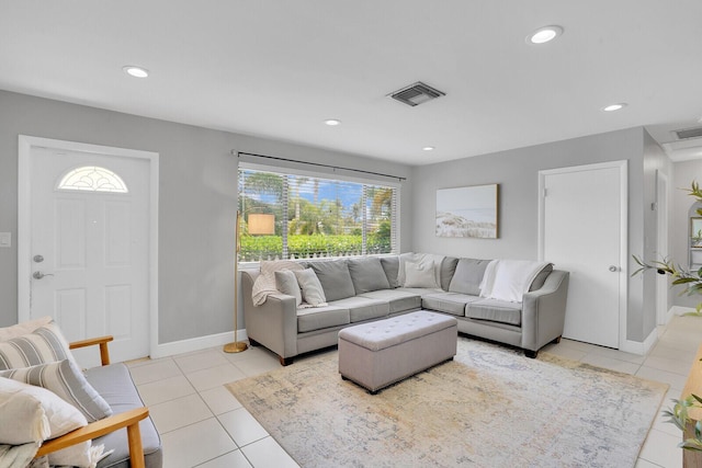 living area with baseboards, visible vents, recessed lighting, and light tile patterned flooring
