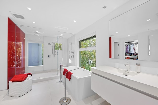 7047 San Sebastian Cir, Boca Raton, FL 33433 - full bath with a shower stall, a freestanding bath, vanity, recessed lighting, and tile patterned flooring