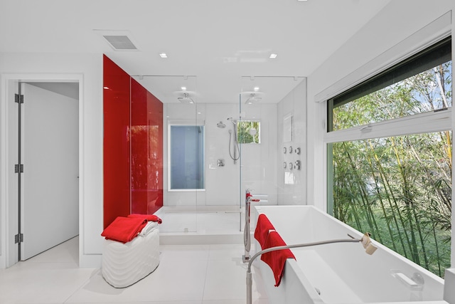 7047 San Sebastian Cir, Boca Raton, FL 33433 - full bath with a freestanding bath, a stall shower, and tile patterned floors