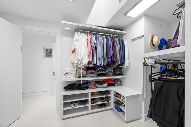 7047 San Sebastian Cir, Boca Raton, FL 33433 - spacious closet featuring tile patterned flooring