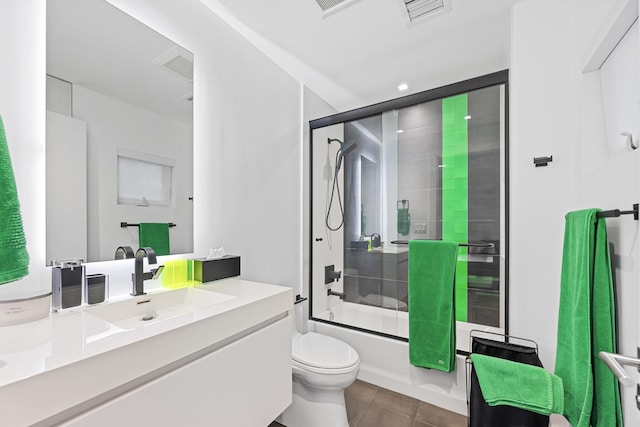 7047 San Sebastian Cir, Boca Raton, FL 33433 - bathroom with vanity, toilet, combined bath / shower with glass door, tile patterned floors, and recessed lighting