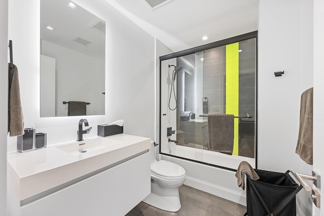 7047 San Sebastian Cir, Boca Raton, FL 33433 - full bathroom with toilet, vanity, bath / shower combo with glass door, tile patterned floors, and recessed lighting