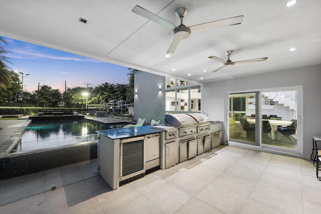 7047 San Sebastian Cir, Boca Raton, FL 33433 - view of patio with beverage cooler, a ceiling fan, and an outdoor pool