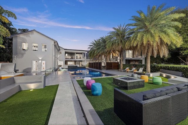 7047 San Sebastian Cir, Boca Raton, FL 33433 - view of home's community with an outdoor living space with a fire pit, a swimming pool, a patio area, a yard, and area for grilling