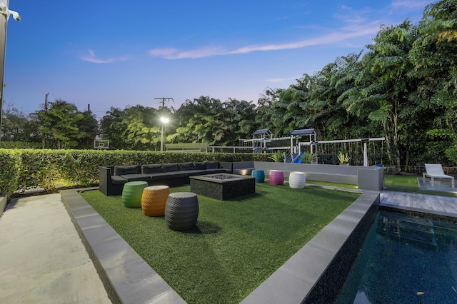 7047 San Sebastian Cir, Boca Raton, FL 33433 - surrounding community featuring a lawn, a pool, and an outdoor living space with a fire pit
