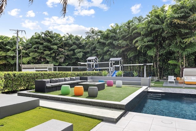 7047 San Sebastian Cir, Boca Raton, FL 33433 - view of property's community featuring an outdoor living space with a fire pit and a swimming pool