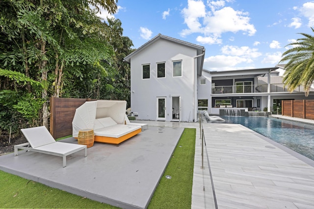 7047 San Sebastian Cir, Boca Raton, FL 33433 - back of house with a patio, french doors, stucco siding, and a balcony