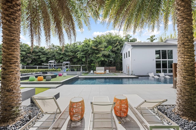 7047 San Sebastian Cir, Boca Raton, FL 33433 - view of pool featuring an outdoor hangout area and a patio