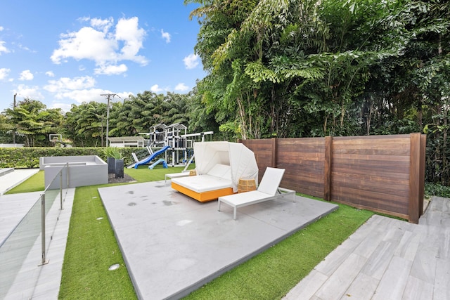 7047 San Sebastian Cir, Boca Raton, FL 33433 - view of patio featuring a playground and view of scattered trees