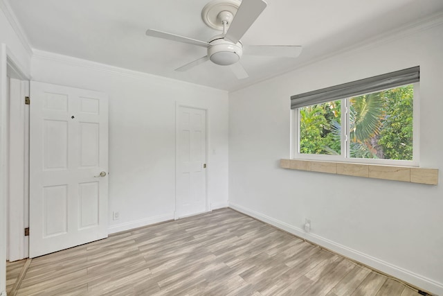 3272 NW 3rd Ave, Oakland Park, FL 33309 - unfurnished bedroom with a ceiling fan, light wood-style flooring, crown molding, and baseboards