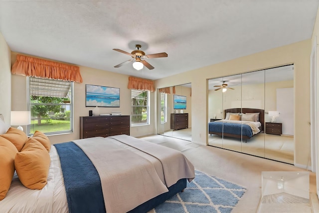 6472 Overland Dr, Delray Beach, FL 33484 - carpeted bedroom with multiple closets, a ceiling fan, and baseboards