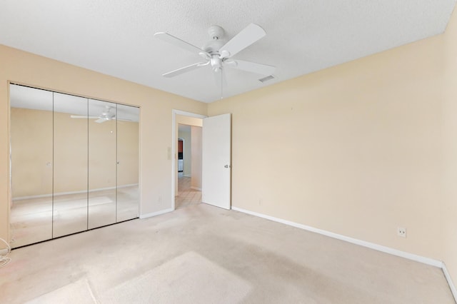 6472 Overland Dr, Delray Beach, FL 33484 - unfurnished bedroom featuring a closet, baseboards, a ceiling fan, visible vents, and carpet